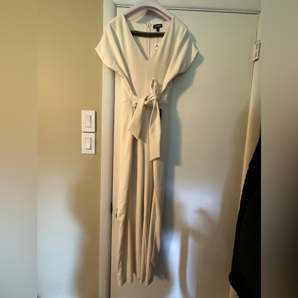 Brand new with tags, Express jumpsuit. Has pockets!